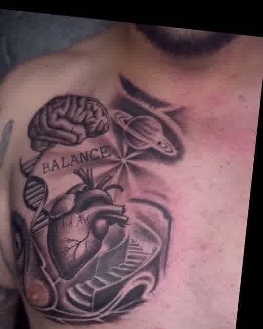 Black and grey anatomical chest piece lettered Balance, with a brain and a heart